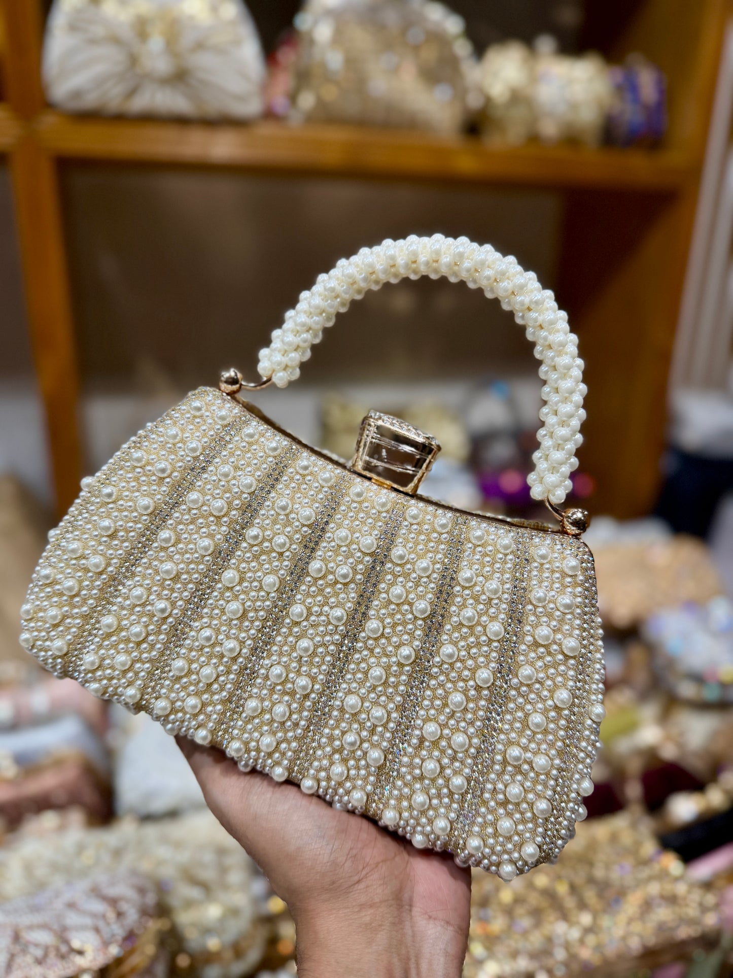 Pearl worked exclusive handle party clutch