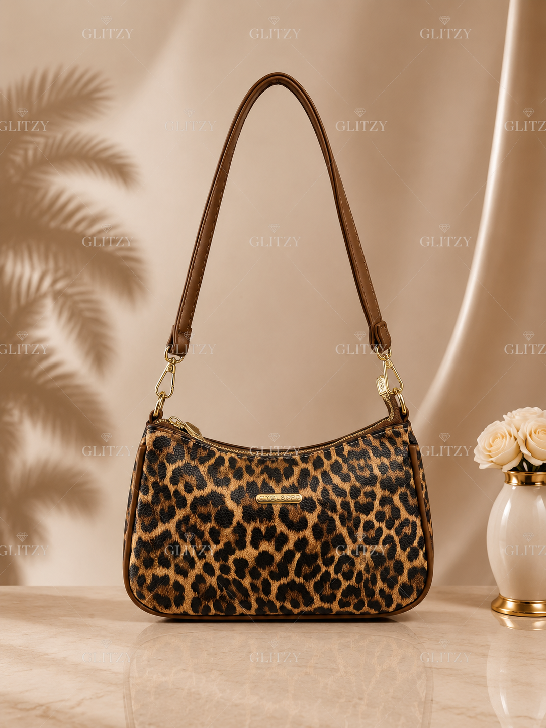 Fashionable YGLS shoulder sling bag and long strap. | GLITZY leopard