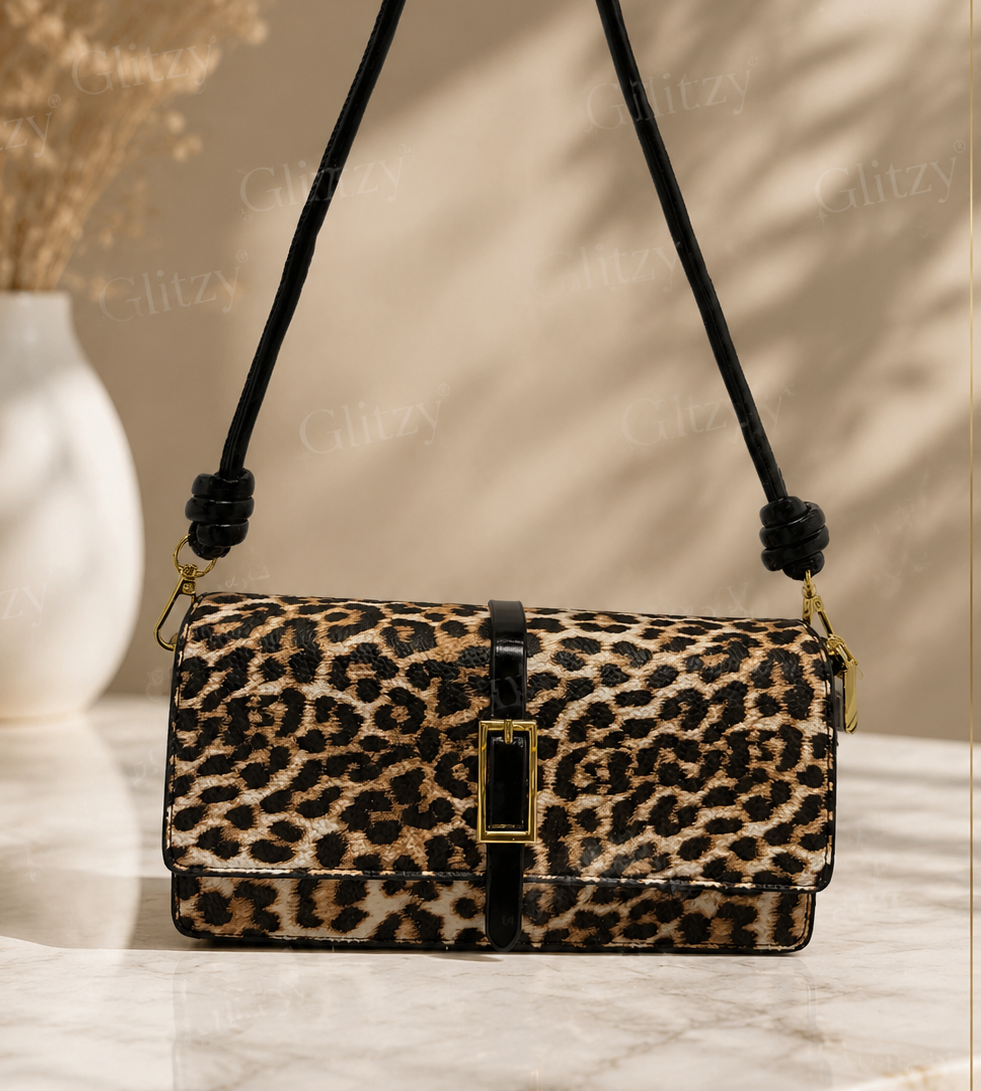 fashionable shoulder bag with short slim belt and long strap. | leopard print black