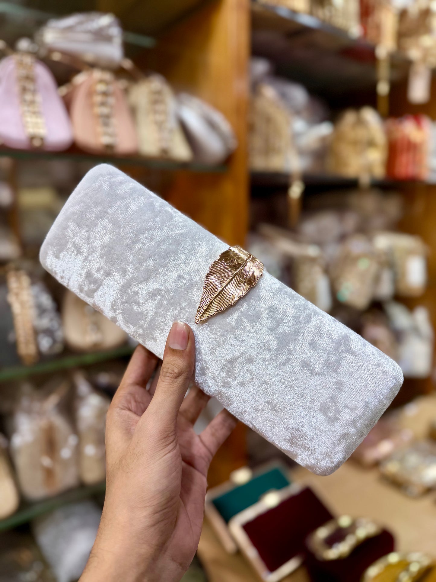 Velvet leaf design clutch