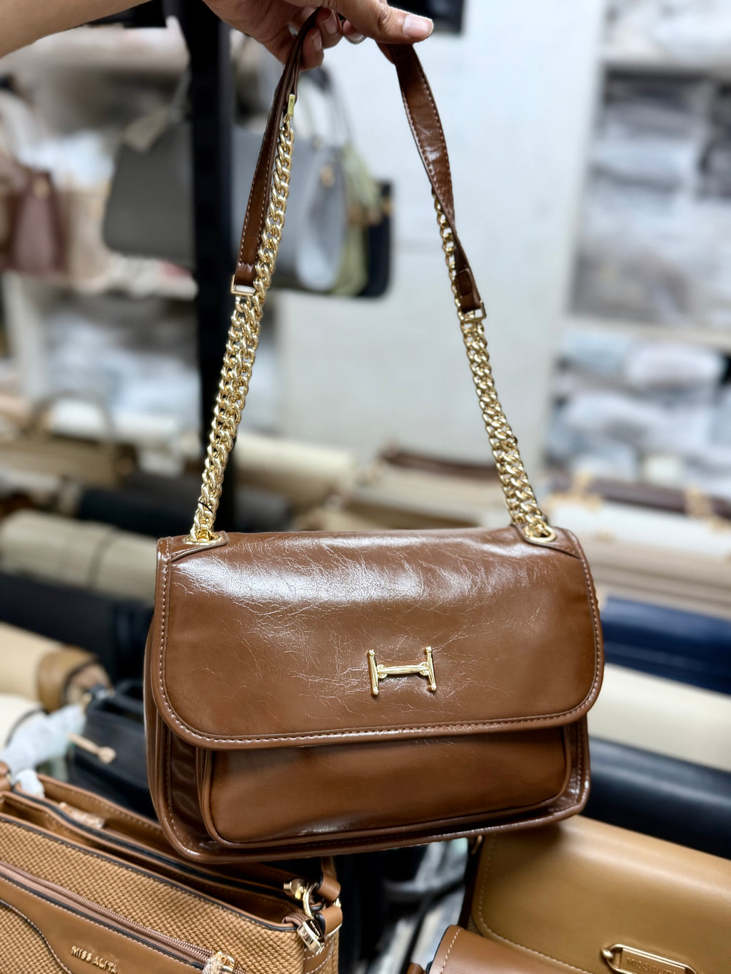 High end premium pu shiny leather finished soft sling bag