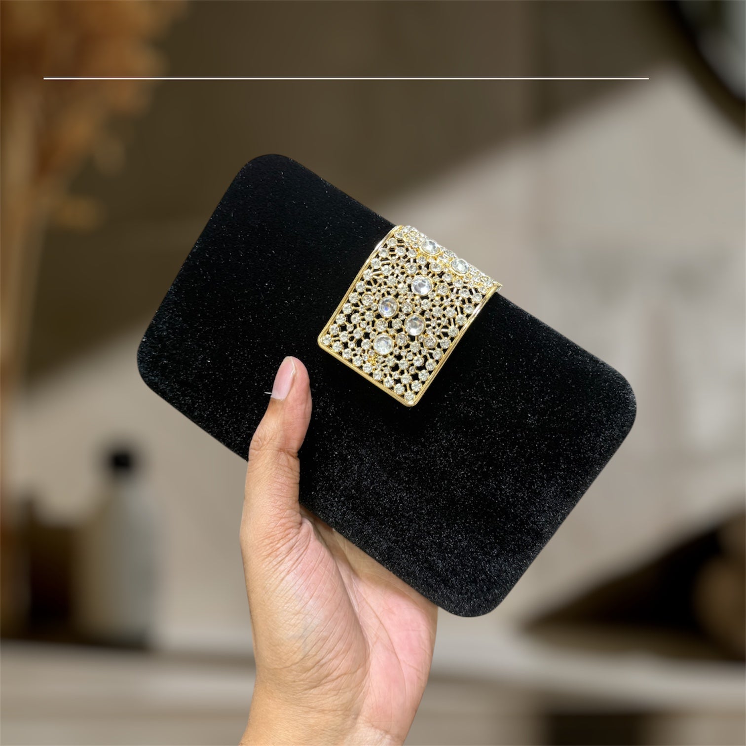 A chic evening party clutch with a velvet finish.