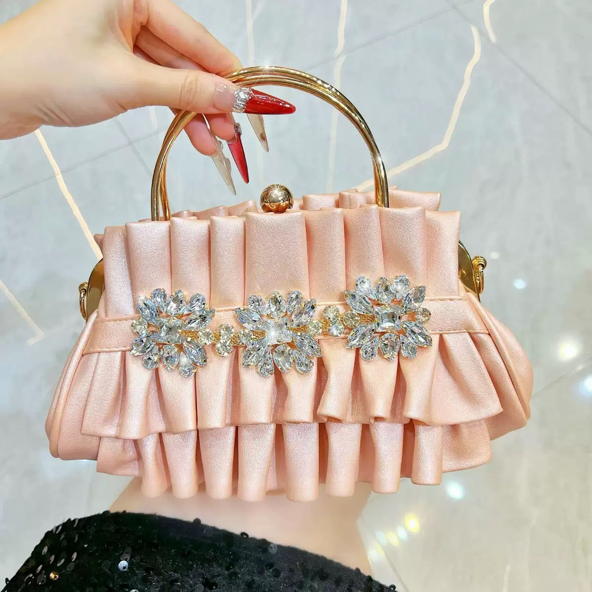 Fashionable and beautiful looking party hand purse available.