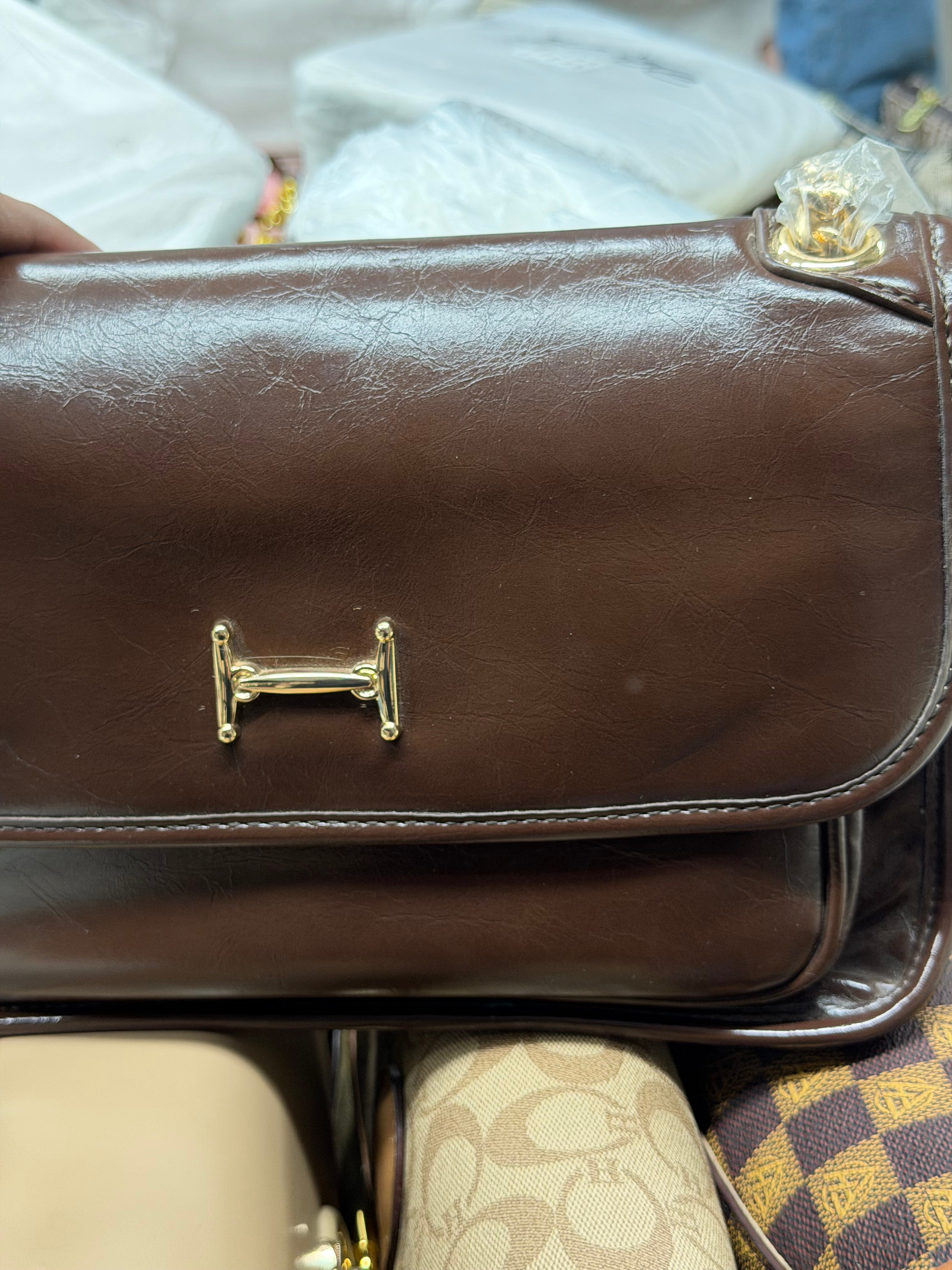 High end premium pu shiny leather finished soft sling bag