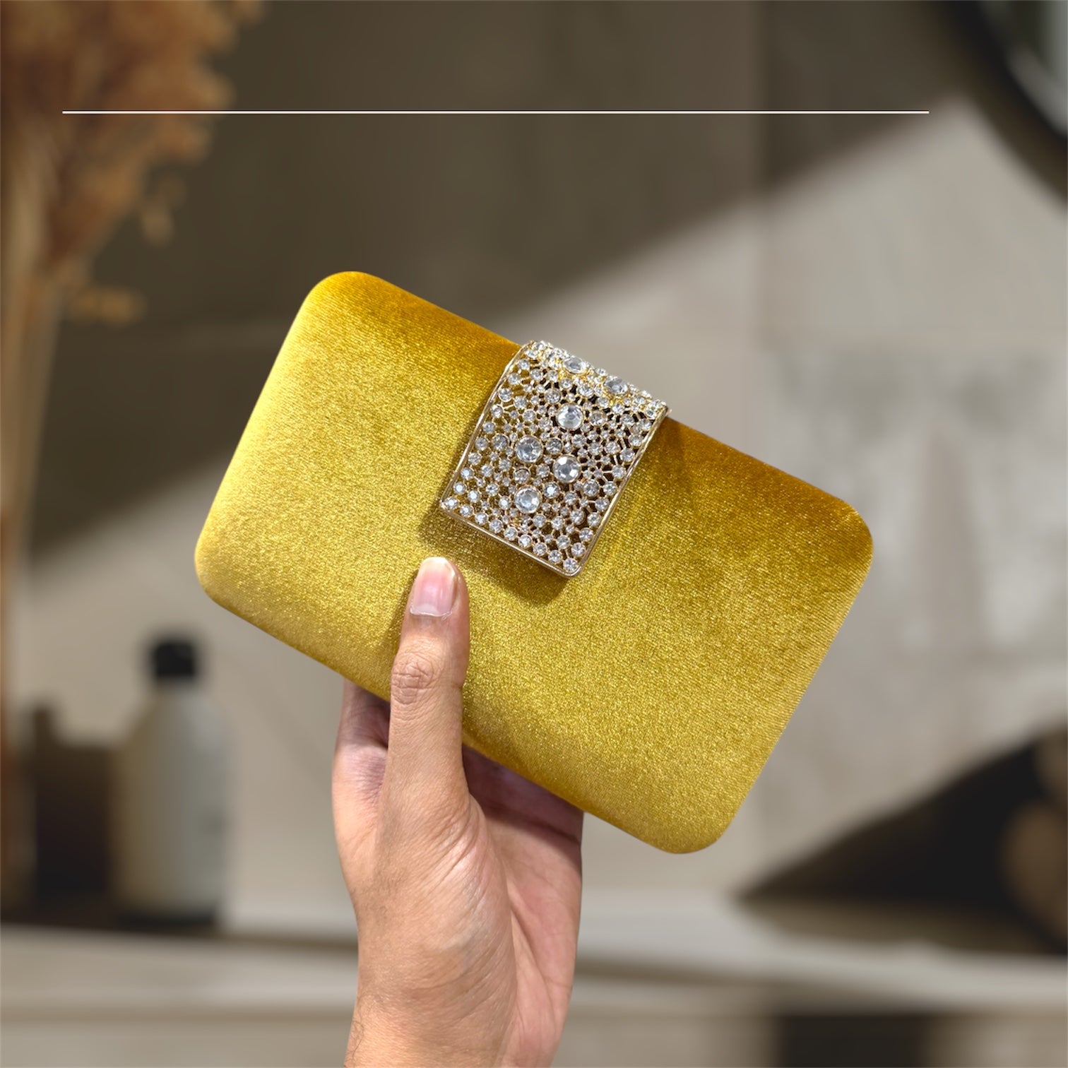A chic evening party clutch with a velvet finish.