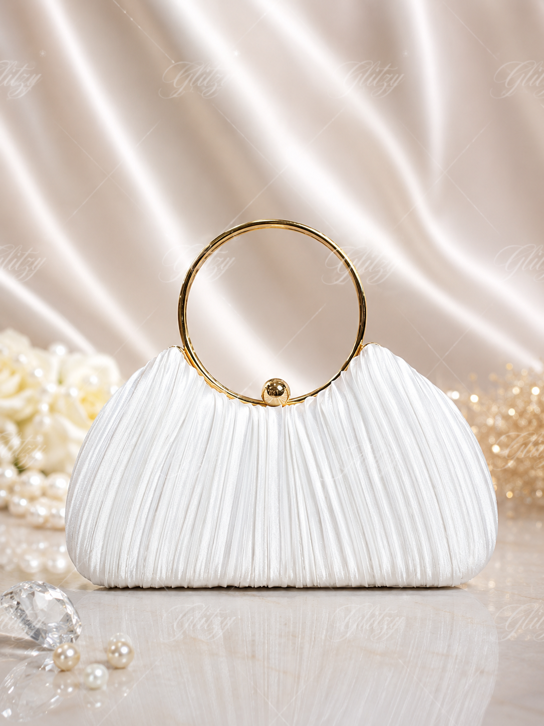 Beautiful and simple classy ring handle party clutch | Glitzy