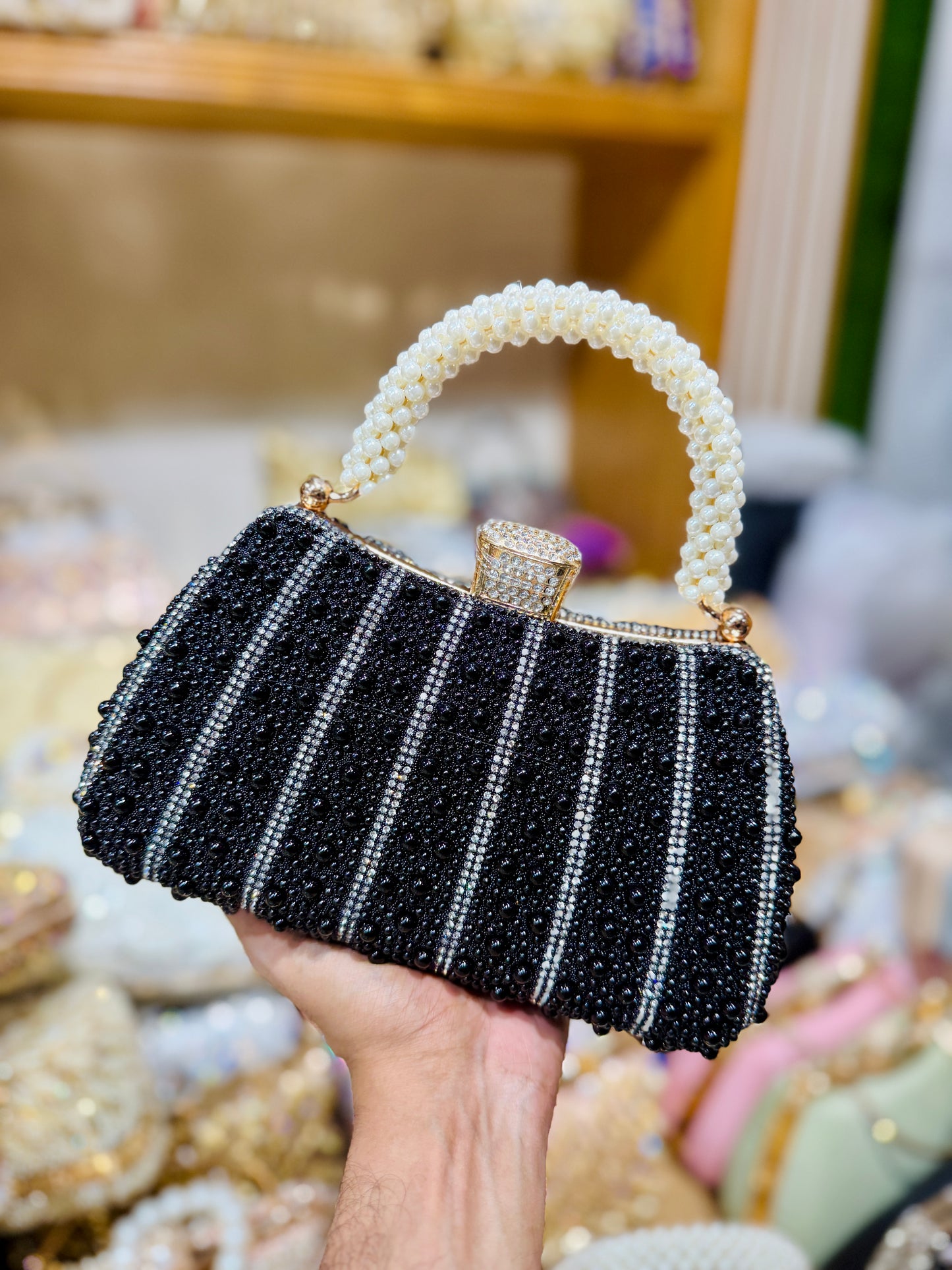 Pearl worked exclusive handle party clutch