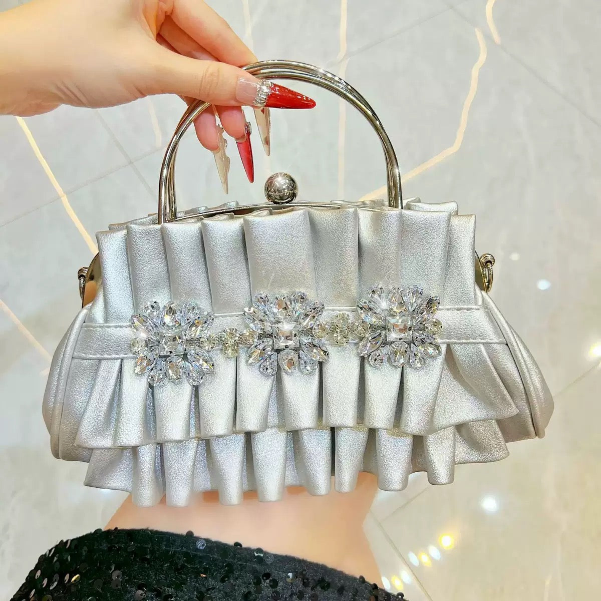 Fashionable and beautiful looking party hand purse available.