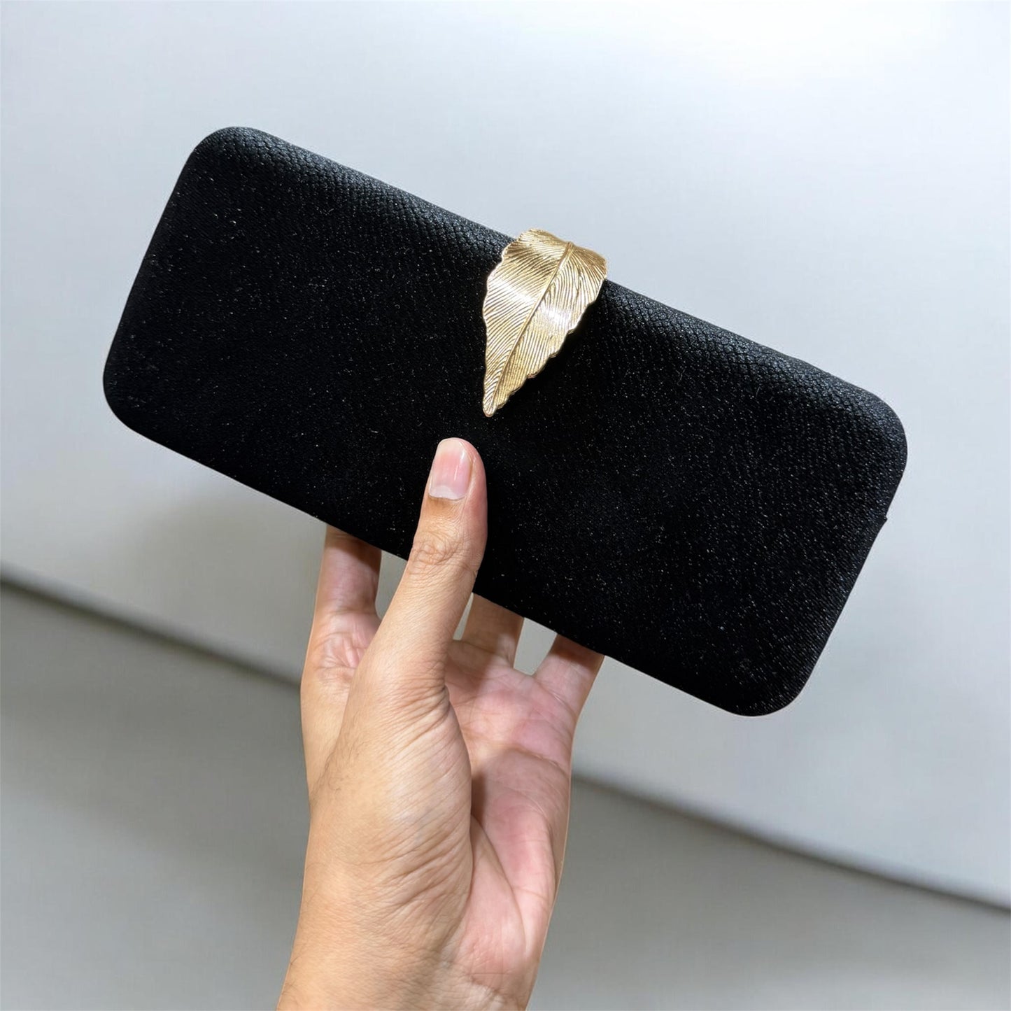 A Velvet leaf lock stylish hand purse
