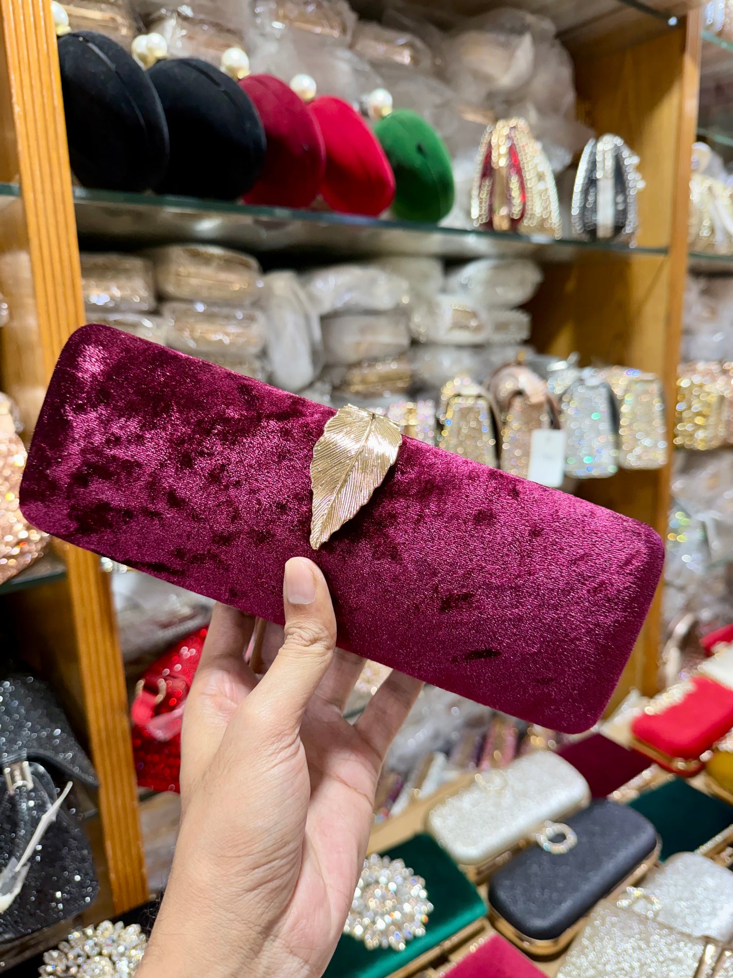 Velvet leaf design clutch