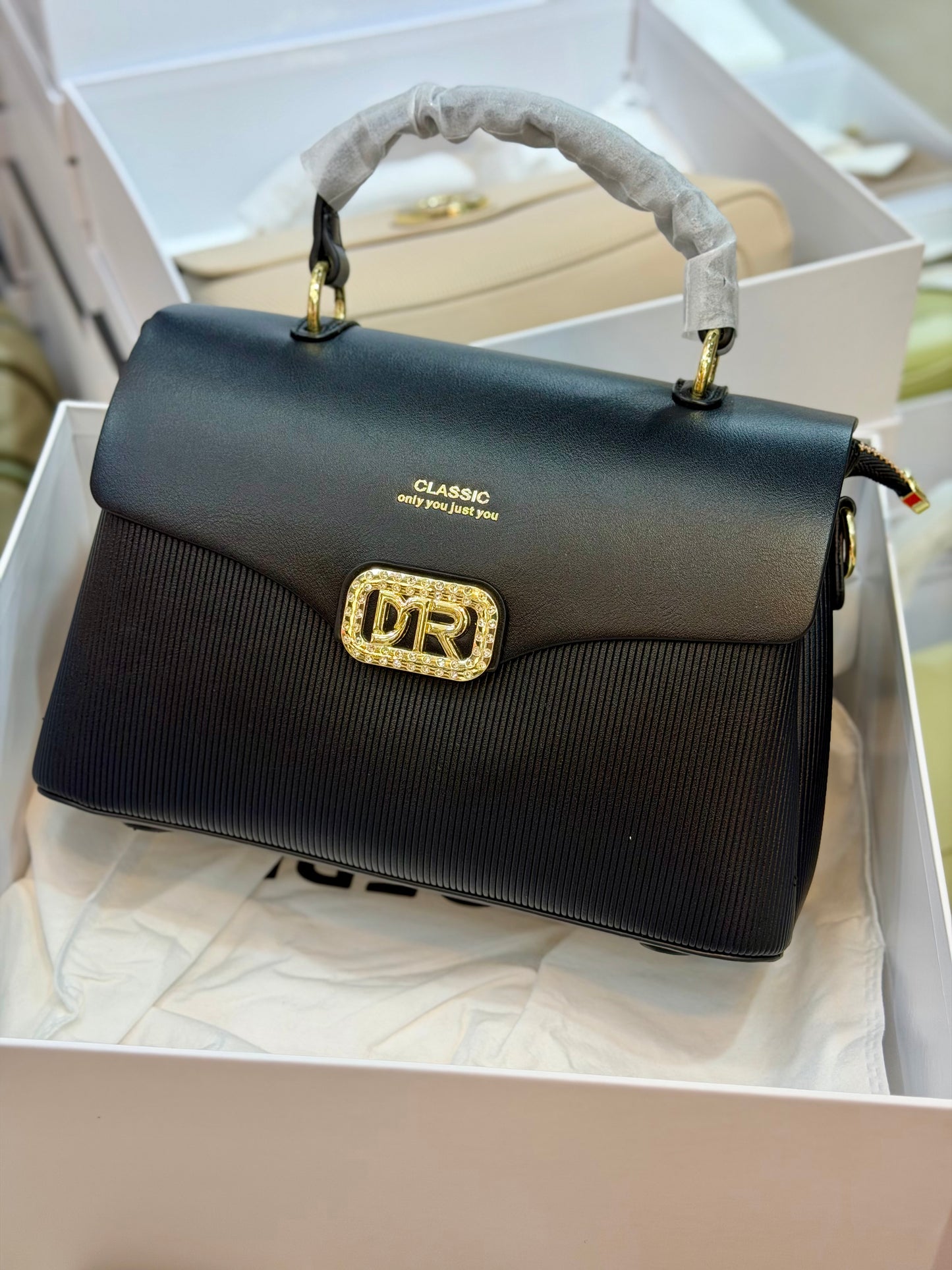 Exclusive classic brand premium handbag with boxed packaging