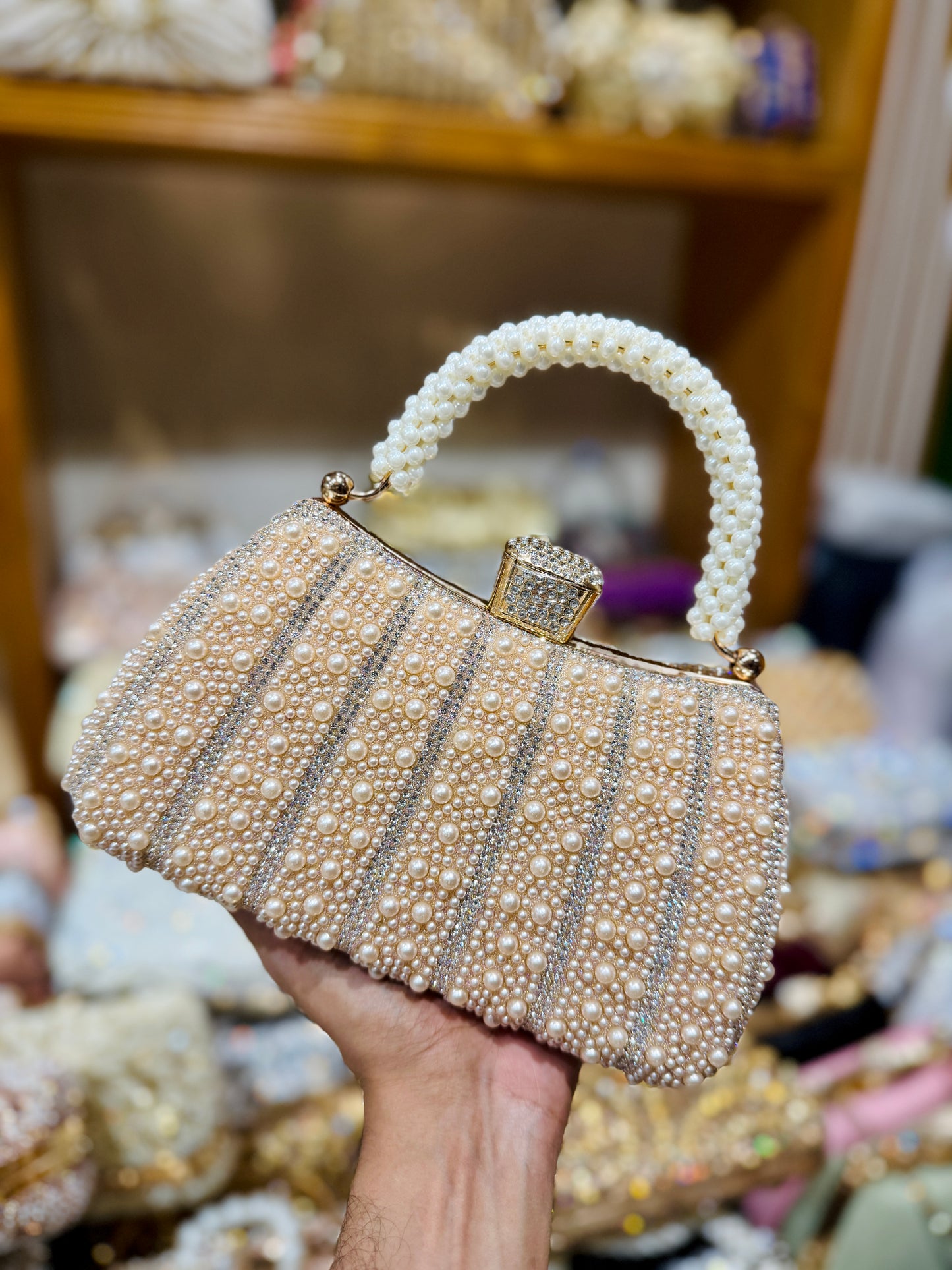 Pearl worked exclusive handle party clutch