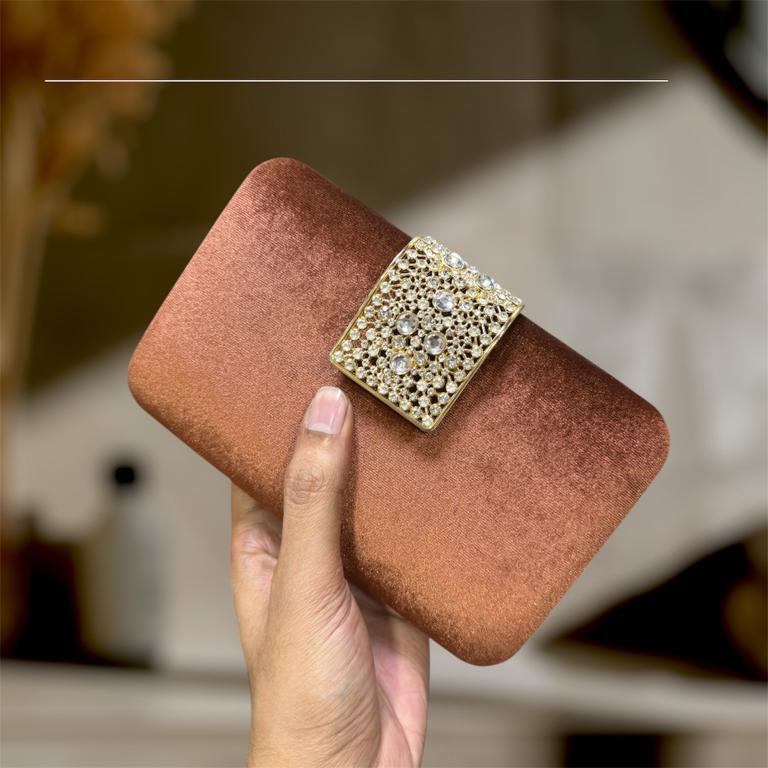 A chic evening party clutch with a velvet finish.