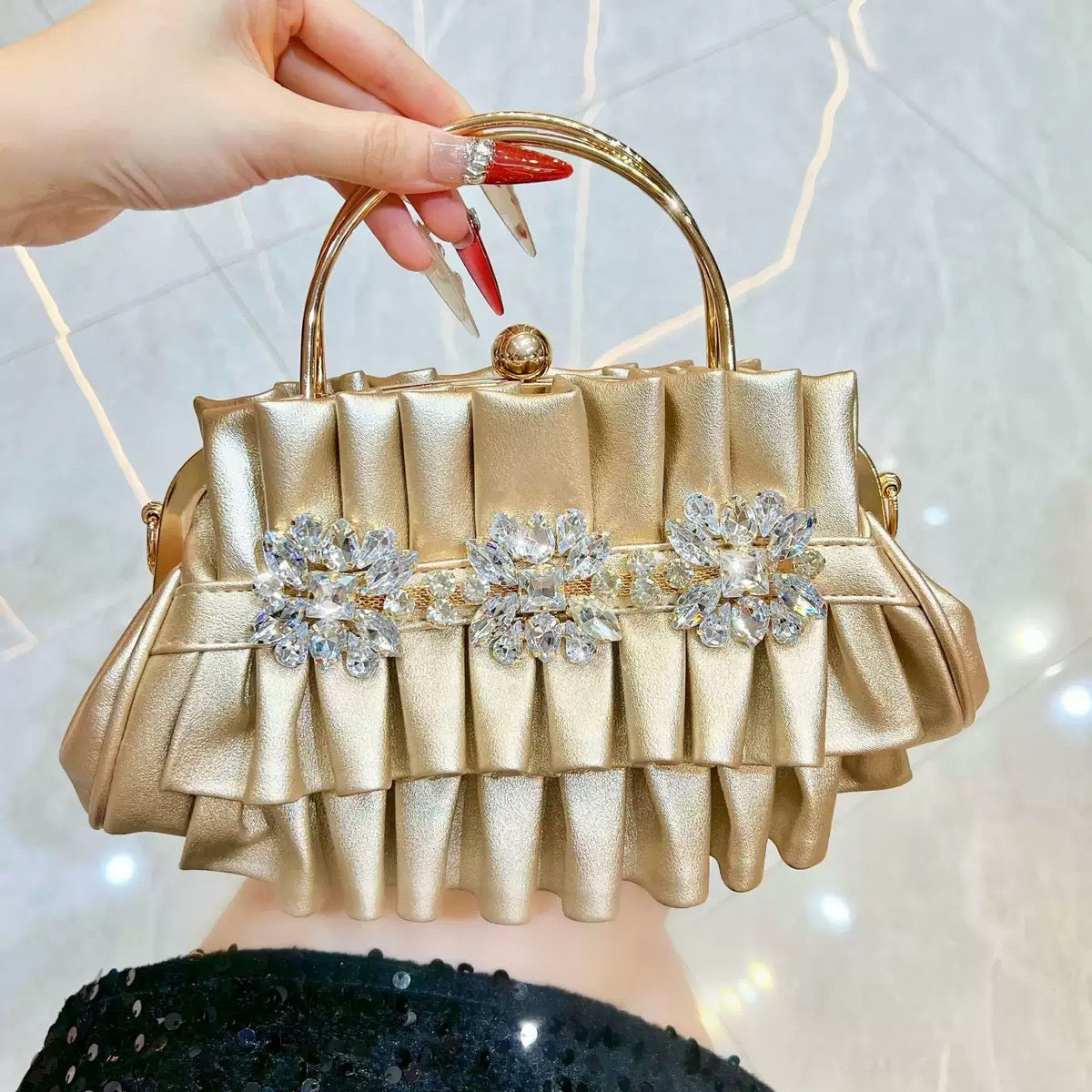 Fashionable and beautiful looking party hand purse available.