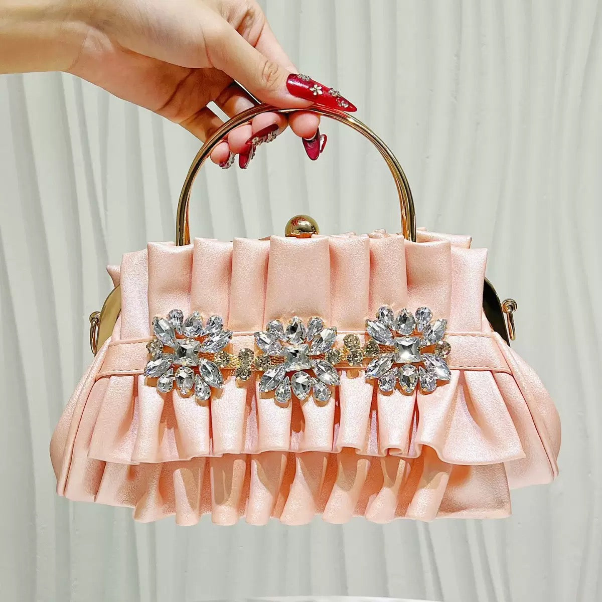 Fashionable and beautiful looking party hand purse available.