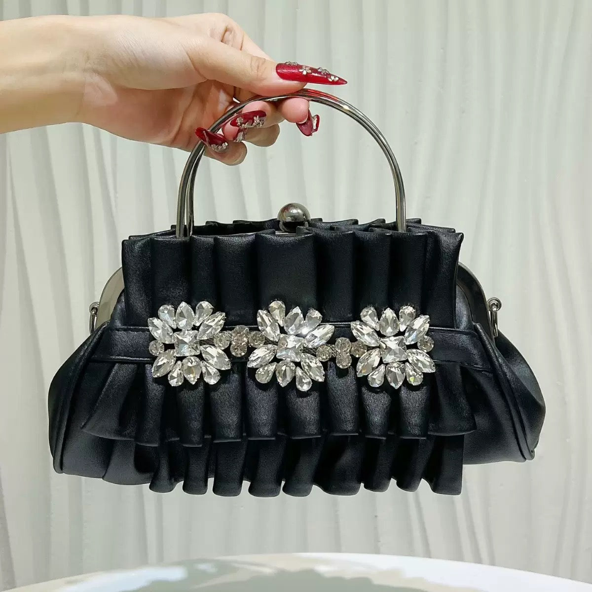Fashionable and beautiful looking party hand purse available.