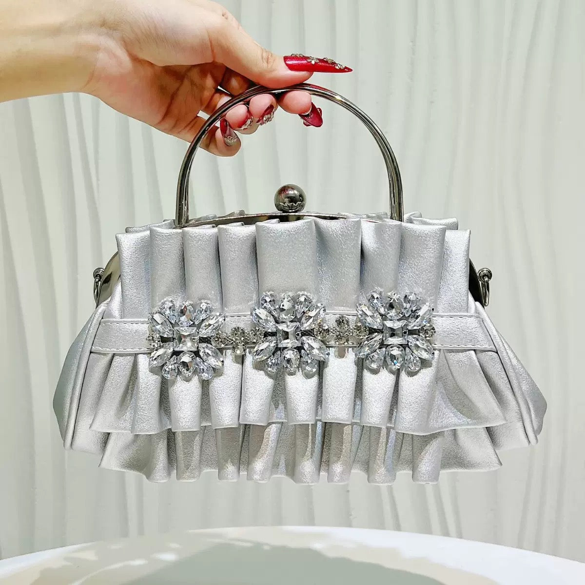 Fashionable and beautiful looking party hand purse available.