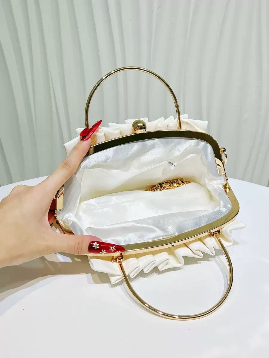 Fashionable and beautiful looking party hand purse available.