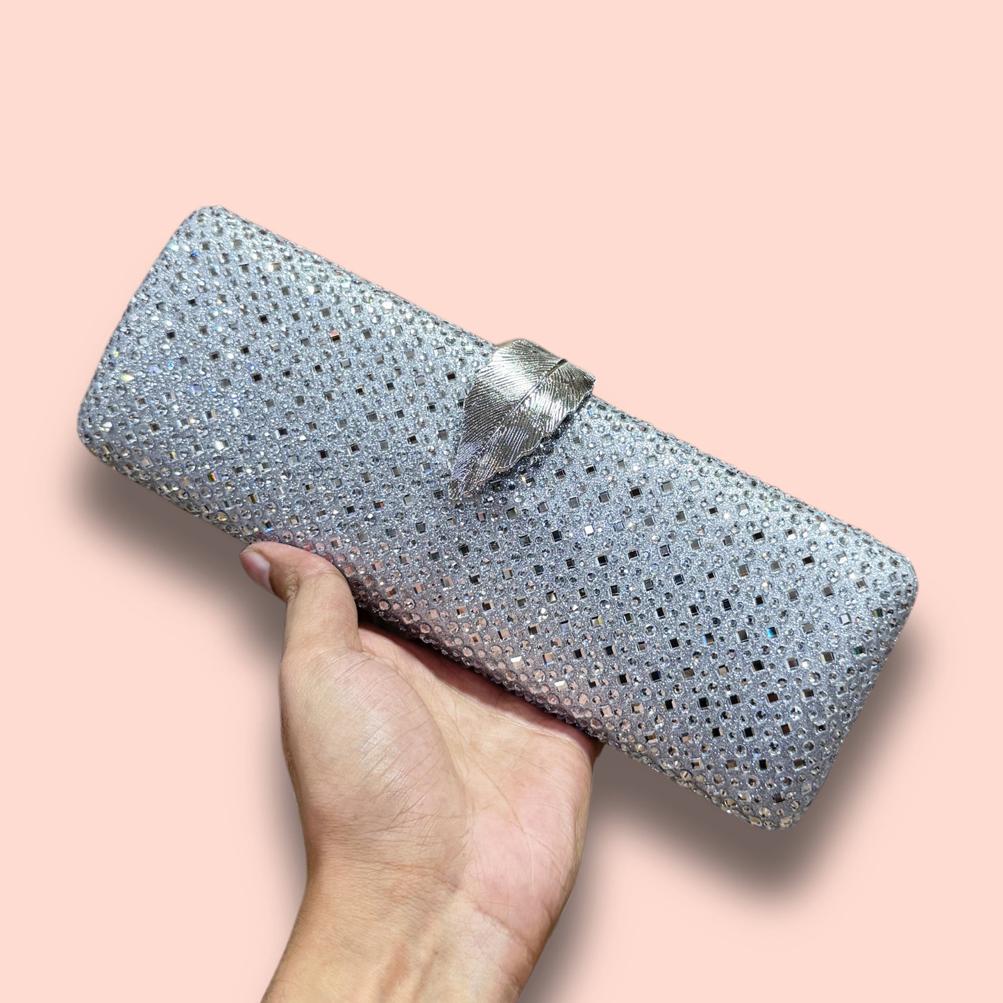 Gorgeous leaf lock design all over shiny mirror stone worked long clutch