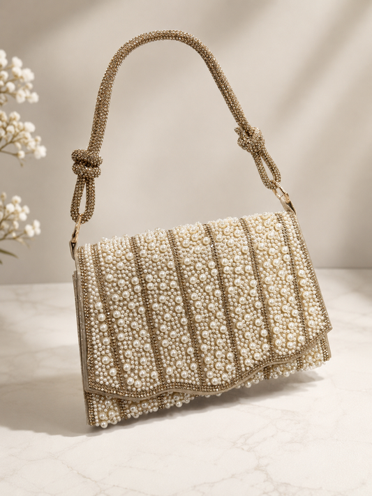 Gorgeous full pearl design party handbag with full stone worked handle