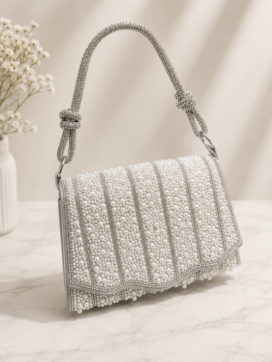 Gorgeous full pearl design party handbag with full stone worked handle