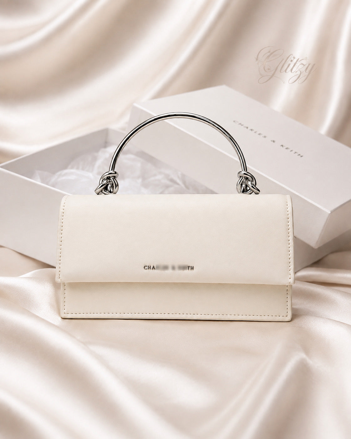 Stylish metal top handle mini ladies handbag in BD